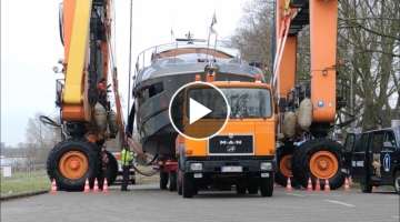 Transportation of a 100-ton boat with a crane in Germany...